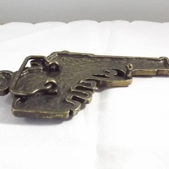 Distressed Pistol in a Skeleton Hand Novelty Belt Buckle - Picture 8 of 9